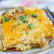 Twice Baked Potato Casserole recipe. This is one of the best and easiest casserole recipes you'll find. It's a crowd-pleaser at potlucks and with my own family. #twicebakedpotaotes #twicebakedpotatoecasserole #recipes #callmepmc #potatoes #cheese #bacon #casserole #sidedish #dinner