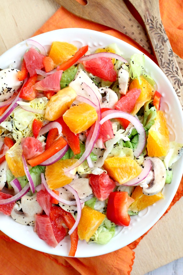 Sweet and Sour Citrus Salad recipe- citrus is the perfect fruit during wintertime. It has fresh vegetables, fruits, honey & poppy seed dressing. #fruit #salad #recipe #fruitsalad #healthy #meal #cleaneating #eatclean