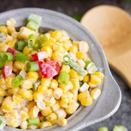 Corn Salad Sweet corn, tomatoes, peppers, onions, and jalapenos are tossed together with creamy mayo.