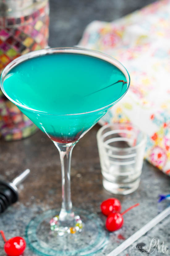 Simply delicious, Kiss on the Lips Cocktail is a sweet martini with flavors of berry and pineapple. It's an easy and fruity cocktail with tropical flavors. It's cool and refreshing on hot spring and summer days. And, just look at that beautiful blue color? How many times do you get to drink such a pretty blue drink? Kiss on the Lips Martini