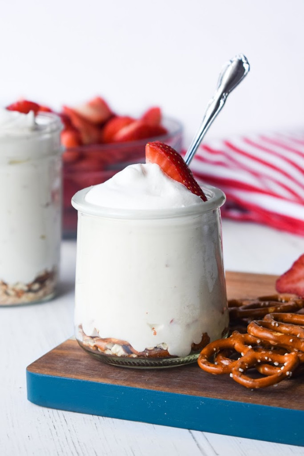 Super easy and quick to prepare, No Cook Strawberry Cheesecake is a true winner and always a crowd pleaser! It's rich, creamy, sweet, and so refreshing! #nocook #nobake #cheesecake #strawberry #fruit #sweetenedcondensedmilk #whippedcream #dessert #recipe Strawberry Cheesecake