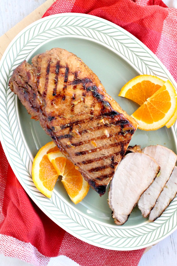 Orange Marmalade Pork Tenderloin - grilled & glazed with orange marmalade & spices. Great for entertaining or easy enough weeknight dinner! #recipe #pork #tenderloin #grilled #orange 