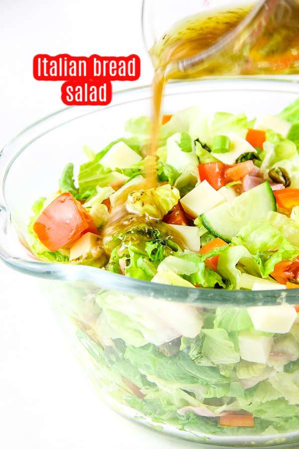 Panzanella Salad Recipe is a delicious salad that perfect all year. It's great on its own or as a side dish and works great alongside grilled meats or oven-roasted dinners. #salad #Italian #Italianbread #recipe #panzanella #tomatoes Panzanella Salad
