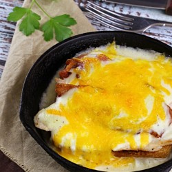 Kentucky Hot Brown a classic, open-face sandwich recipe. The Kentucky Hot Brown is served hot with a creamy sauce and melted cheese.