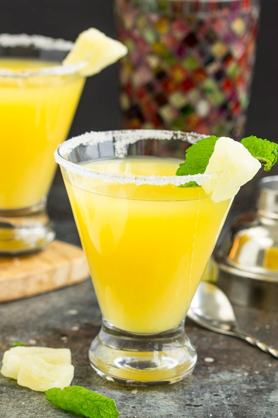 Sweet and festive, a Pineapple Martini is a crazy delicious tropical inspired martini. Sweet and festive, this drink is a crazy delicious tropical inspired martini.