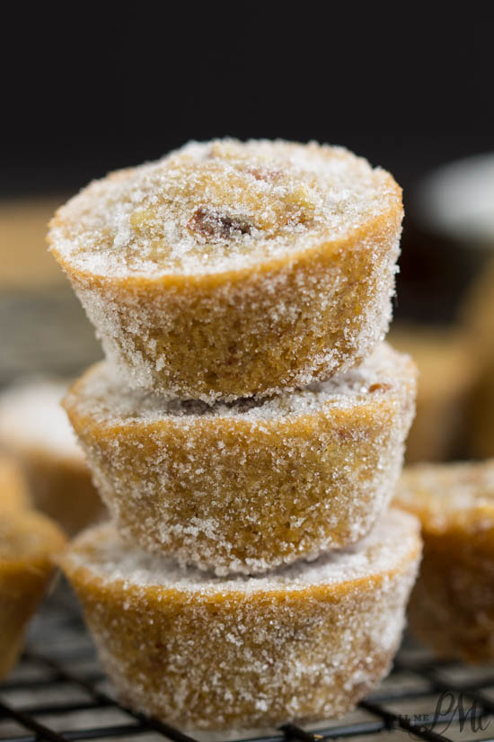 Praline Muffins are decadent bites of buttery pecan-filled muffins. Soft and moist, this muffin recipe is quick and easy to make. It's a nice treat any day for breakfast or snack. Breakfast treats cooling on a wire rack.