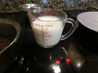 milk in a glass measuring cup.