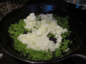 onions and peppers cooking