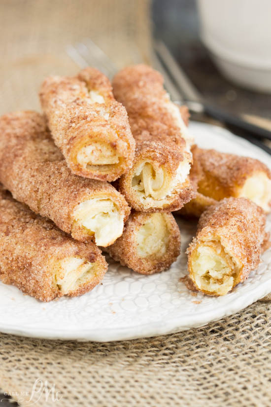 Cream Cheese Cinnamon Rollups is a sweet creamy filling rolled between layers of crust with a light dusting of a cinnamon-sugar coating. platter of cinnamon sugar rollups