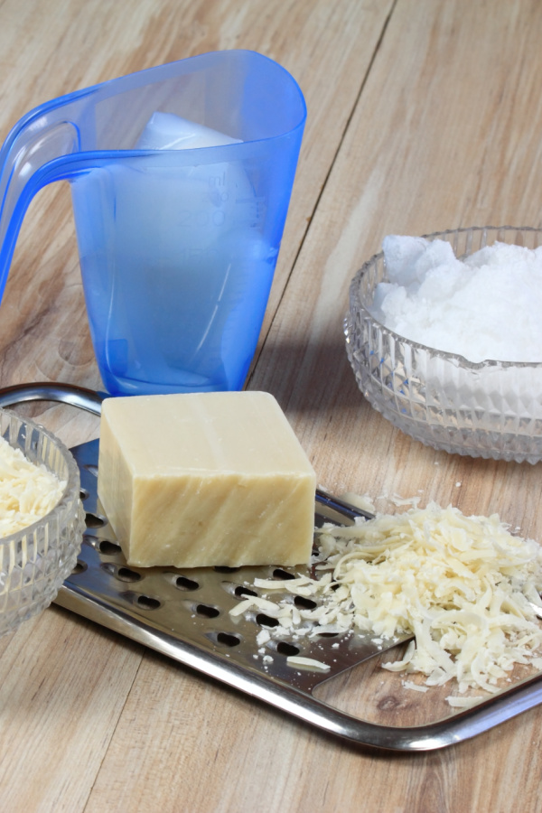 bar detergent and grater Best DIY Washing Detergent, much cheaper than store-bought! Learn how to make homemade laundry soap for just pennies!