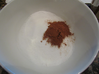ground cinnamon and sugar in white bowl.