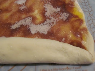 cinnamon sugar mixture on unbaked dough.