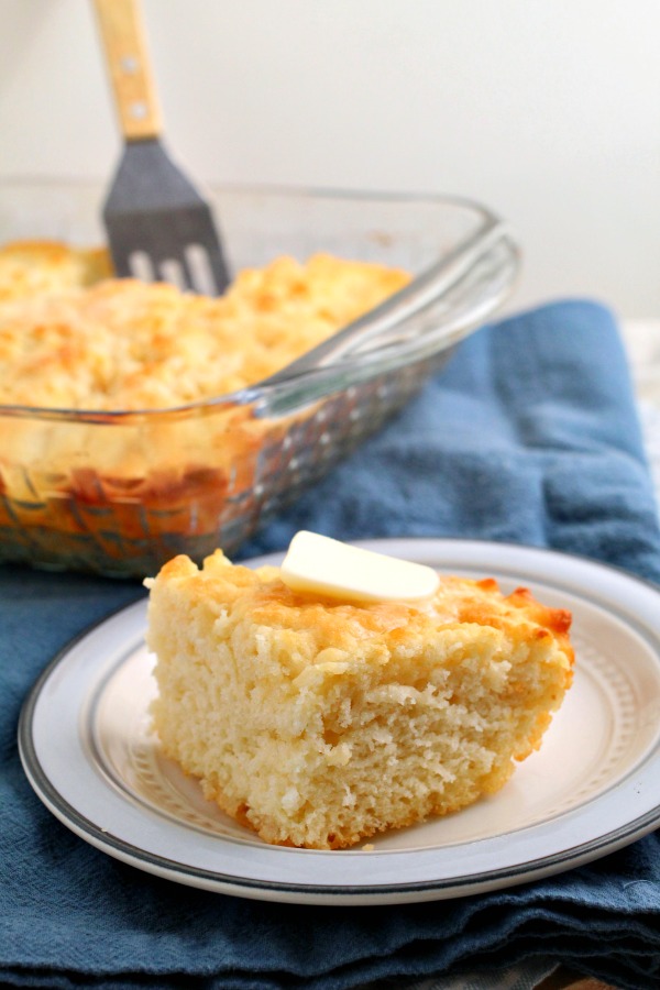 Serving of homemade bread on a small white plate.