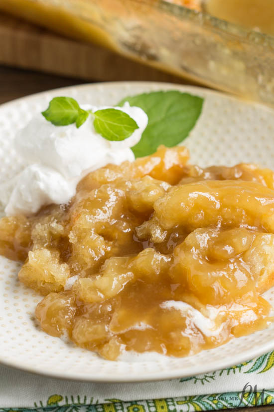 PMc's Caramel Cobbler is rich and buttery and takes just minutes to put together. Perfect for potluck and entertaining. This Caramel Cobbler has a decadent, self-made caramel sauce that you'll want to keep eating and eating!