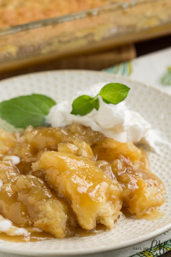 PMc's Caramel Cobbler is rich and buttery and takes just minutes to put together. Perfect for potluck and entertaining. This Caramel Cobbler has a decadent, self-made caramel sauce that you'll want to keep eating and eating! PMc's Caramel Cobbler