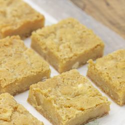 Lemon Cream Bars are Lusciously creamy and bursting with bright lemon flavor. Deliciously crumb bars start with a cookie mix and have a zesty lemon filling.