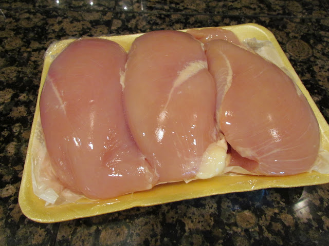 package of three uncooked boneless skinless chicken breasts
