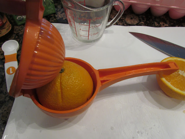squeezing half orange