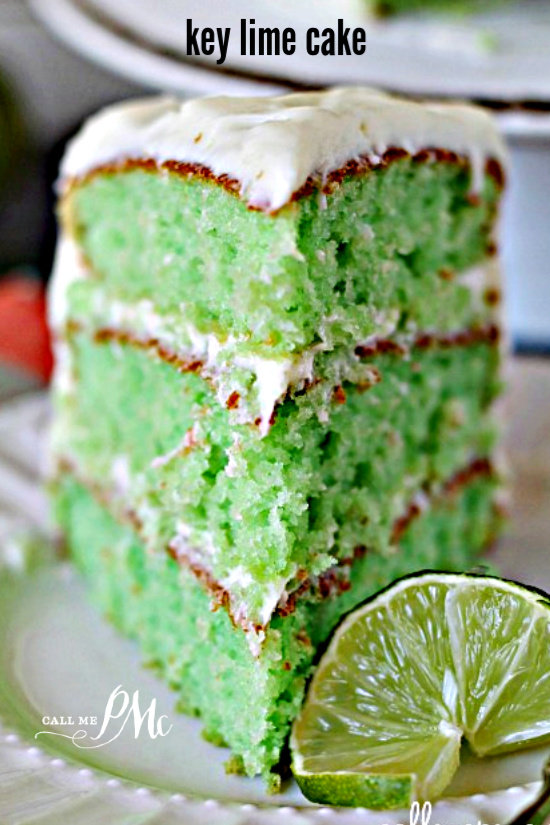 Plated slice of three layer key lime cake with key lime cream cheese frosting.