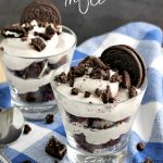 Oreo Cheesecake Trifle in disposable cups makes easy, individual desserts for picnics, socials, and cookouts. #trifle #Oreo #chocolate #darkchocolate #dessert #cheesecake #jellopudding #chocolatecake #cake #recipe