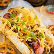 SAUSAGE DOGS Easy and Delicious 15 Minute Meal - Sausage dogs are grilled and layered with sauce and cheese for an easy and delicious meal!