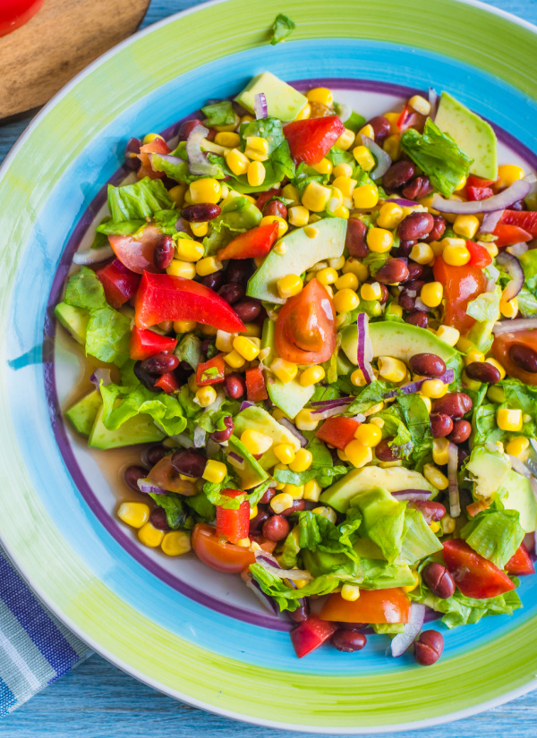 Fresh, colorful, and vibrant, Southwestern Salad with Green Chile Lime Salad Dressing has an incredible, bold flavor. It’s the perfect salad to serve for Taco Tuesday!