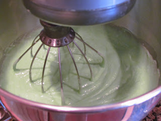 batter for key lime cake in a stand mixer bowl.