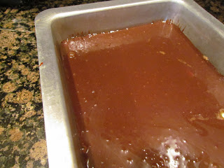 unbaked chocolate peanut butter bars in a baking pan.