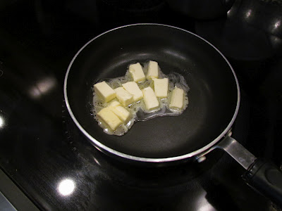 Melted butter in a pan.