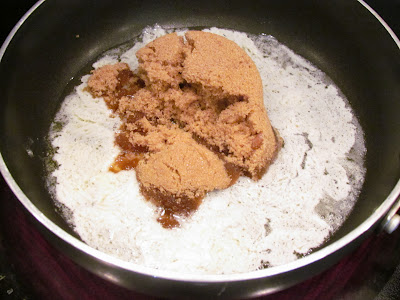 Brown sugar and melted butter in a pan.
