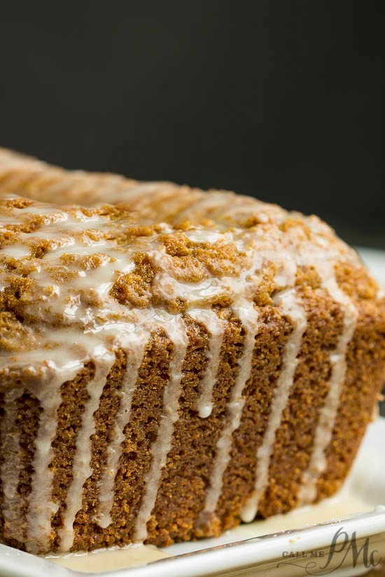 Quick bread with glaze on a tray.