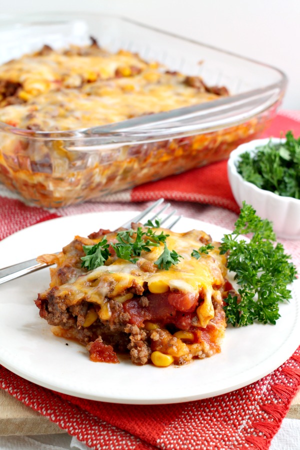 Tamale Pie recipe is quick and easy to make. A spicy beef mixture with Mexican flavors sits on top of creamy grits and replicates the familiar tamale taste an texture. #tamales #casserole #tamalepie #TexMex #recipe Tamale Pie