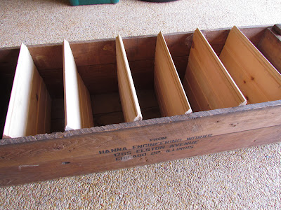 Hand built rack for shoes built with scrap lumber.