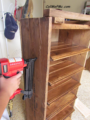 Installing shelves onto a DIY shoe rack.