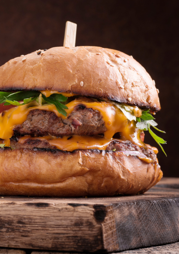 juicy Cajun burger on a brioche bun.