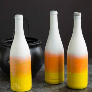 Candy Corn Painted Bottles for Fall Table Decor