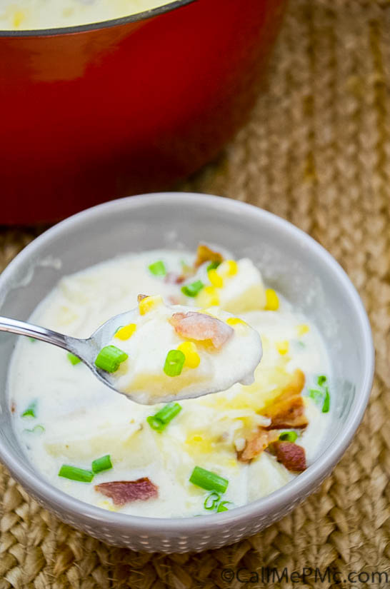 This deliciously creamy Corn and Potato Chowder is filled with diced potatoes, crispy bacon, and a sprinkle of green onion. It's comforting and coziness in a bowl! bowl of creamy corn and potato soup.
