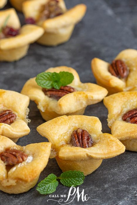 Hot Honey Brie Pecan Bites buttery crescent roll dough is filled with brie, pecans, and drizzled with spicy honey. These make a wonderful slightly sweet appetizer. #pecan #brie #crescentrolls #appetizer #party