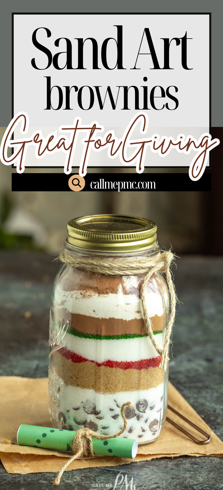 A mason jar filled with colorful, layered brownie mix ingredients sits atop an envelope with a pen, labeled as "sand art brownies in a jar" by callmepmc.com.