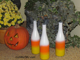 https://www.callmepmc.com/2012/10/candy-corn-painted-bottles.html homemade Halloween yard decorations.