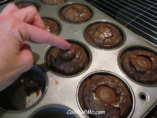 placing caramels onto brownies.