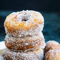 Donuts from Canned Biscuits are a quick, easy, and delicious recipe for Cinnamon Sugar Donuts!