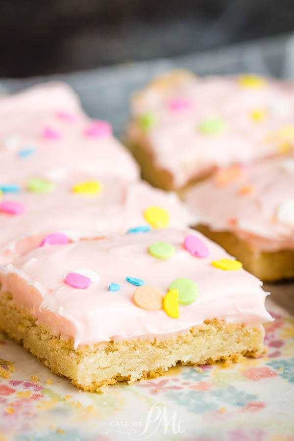 Frosted Sugar Cookie Bars have a super soft cookie base with a luxuriously thick and creamy buttercream frosting on top! #recipe #easy #sheetpan #frosted #Lofthouse #creamcheese #Easter #Christmas