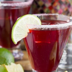 A festive twist on a classic cocktail, this Skinny Pomegranate Margarita is sure to become your new favorite cocktail.   This is a gorgeous, delicious, and refreshing drink recipe that doesn't have to be reserved for the holidays!