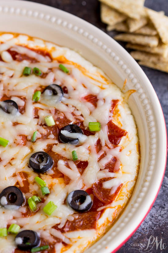 To Die For Pizza Dip is a cheesy, gooey dip that tastes like everyone's favorite comfort food.
