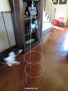 Easy Christmas Tree Project is a simple, budget-friendly do-it-yourself holiday project. Bring festive lights to the front porch! Homemade holiday tree.
