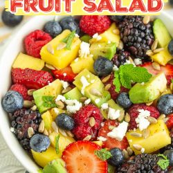 Avocado Fruit Salad with Cranberry Vinaigrette is packed with crunchy greens, bright berries, and creamy avocados.