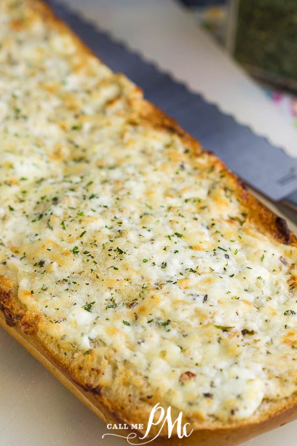 Easy Cheesy Garlic Bread is a delicious, easy, cheesy bread recipe that goes with any casserole, soup, or pasta! It's garlicky and flavorful with crispy edges and a soft, cheesy buttery center. #garlicbread #garlic #bread #sidedish #recipe #callmepmc Easy Cheesy Garlic Bread