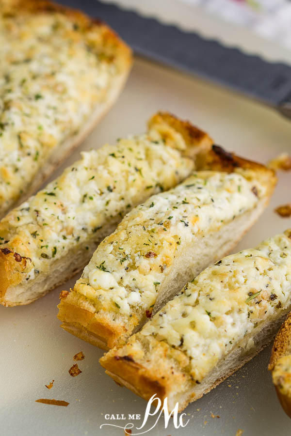 Easy Cheesy Garlic Bread is a delicious, easy, cheesy bread recipe that goes with any casserole, soup, or pasta! It's garlicky and flavorful with crispy edges and a soft, cheesy buttery center. #garlicbread #garlic #bread #sidedish #recipe #callmepmc Easy Cheesy Garlic Bread