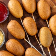 State Fair inspired Baby Sausage Dogs has cornmeal breading on a Lil smokey sausage. You can make this kid-approved, family favorite any time of year!. #kidapproved #recipes #streetfood